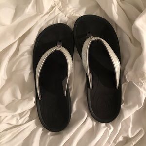 New OluKai Silver Flip Flops